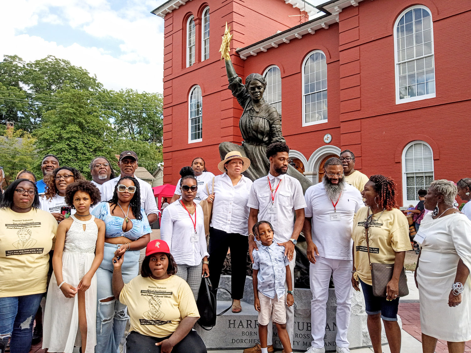 Tubman family descendents gathered to honor their ancestor at the courthouse. Otelia Burrell, front row, second from left, posed as Araminta Ross for Wesley Wofford's statue, joined by Adrian Holmes, far right.